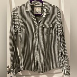 Size small. Button up shirt. Long sleeve.